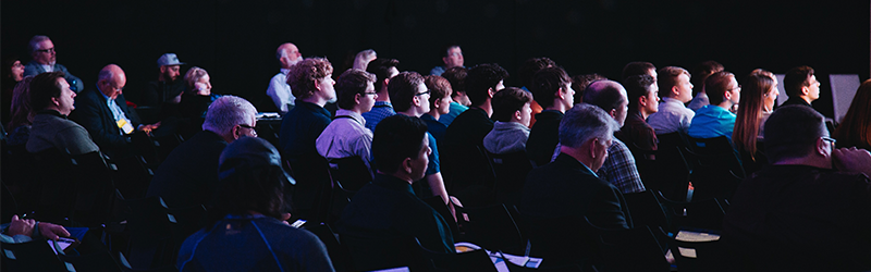 People Attending Conference